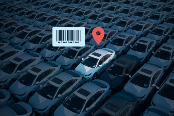 A single car highlighted with a location pin and barcode in a large dealership lot, symbolizing automated vehicle tracking for efficient inventory management.